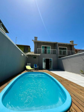 Casa de Hóspedes com Piscina em Porto Belo